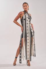 ON MY BEST BEHAVIOR TASSEL MAXI DRESS