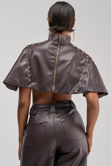 STUDDED FAUX LEATHER CAPE IN DARK CHOCOLATE