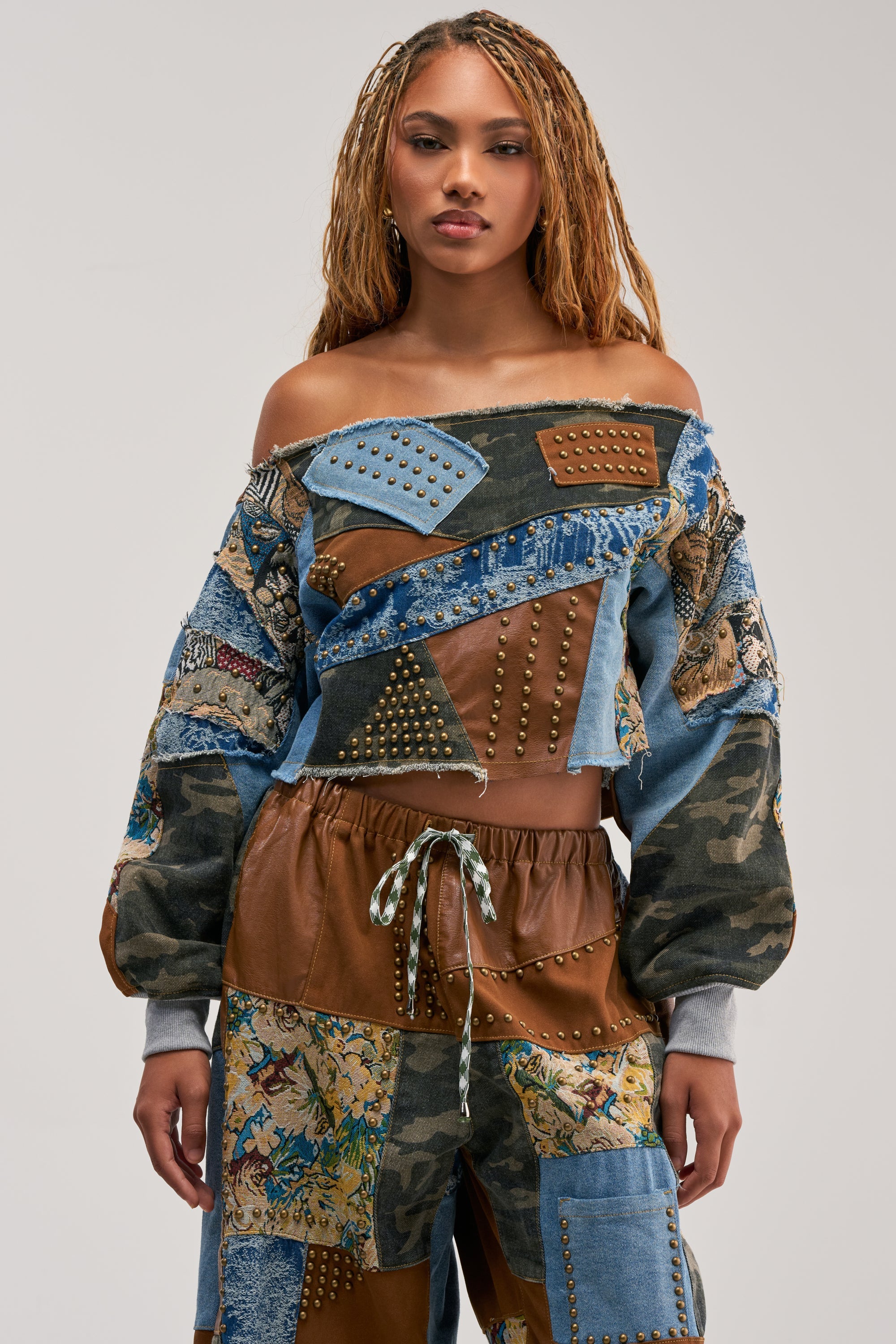 CALL ME CRAZY PATCHWORK OFF THE SHOULDER SWEATSHIRT IN BROWN MULTI