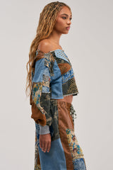 CALL ME CRAZY PATCHWORK OFF THE SHOULDER SWEATSHIRT IN BROWN MULTI