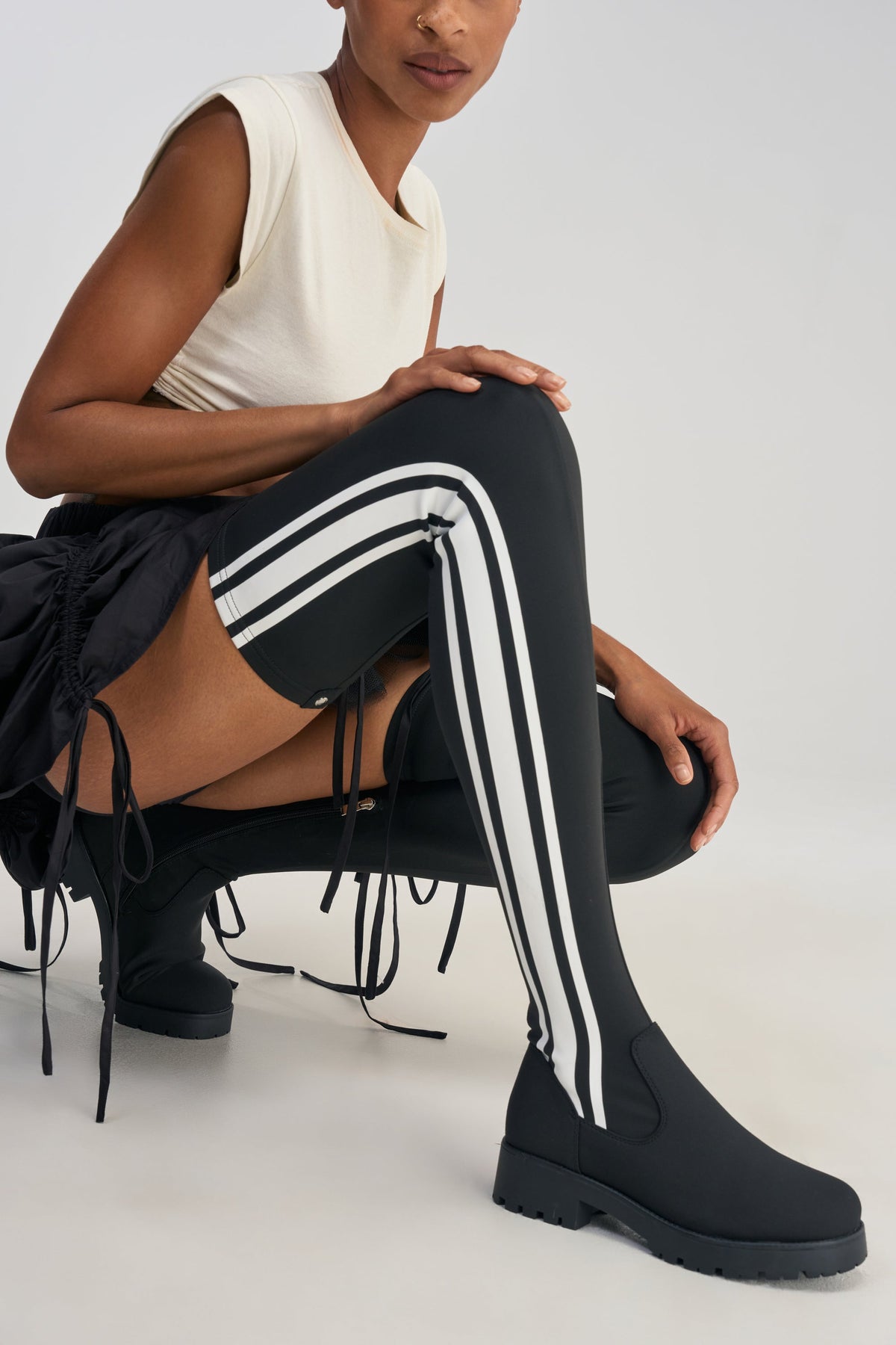 AKIRA GOLD DARBY BLACK FLAT STRETCH SPORTY BOOT