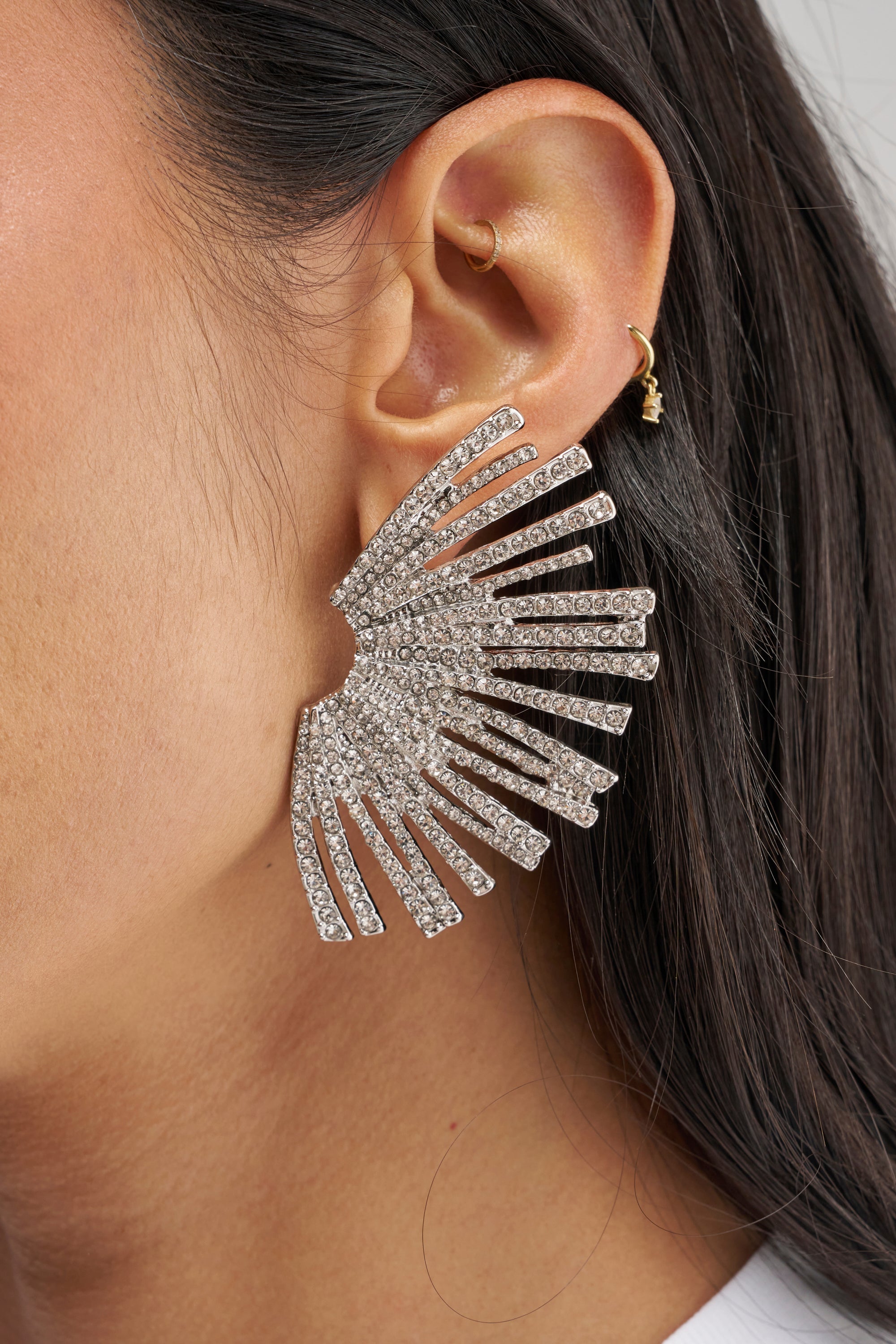 CRYSTAL STARBURST EARRINGS IN CLEAR