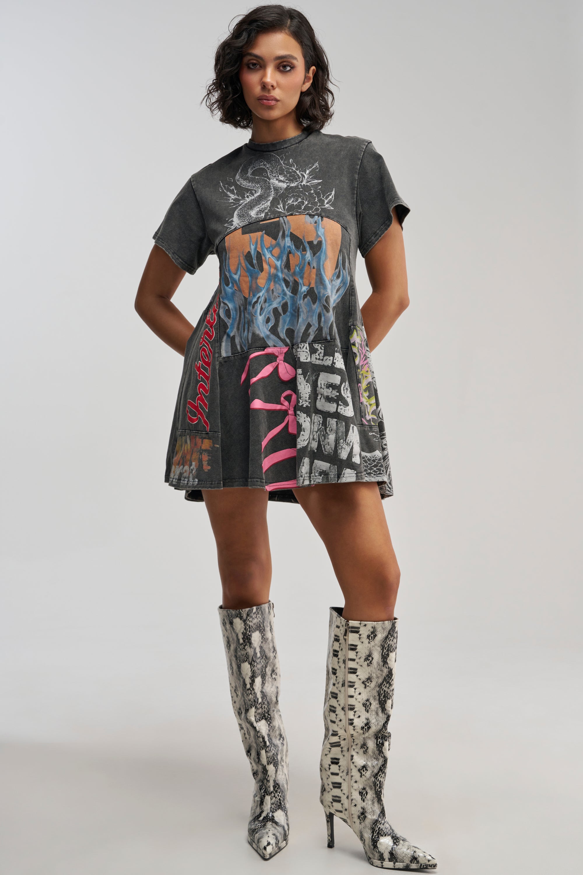 COLD HEARTED GRAPHIC MINI DRESS IN BLACK MULTI