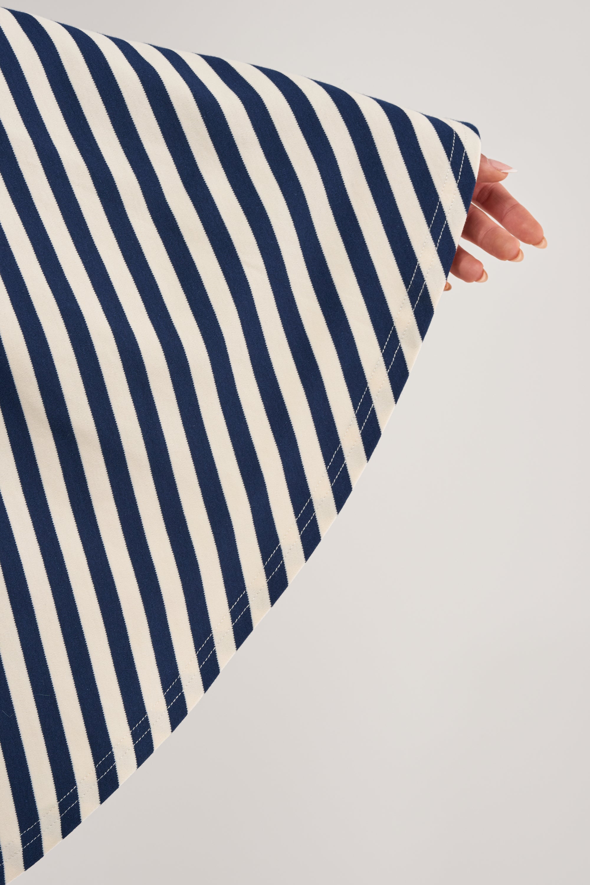 ALMA STRIPE COLLARED BODYSUIT IN NAVY