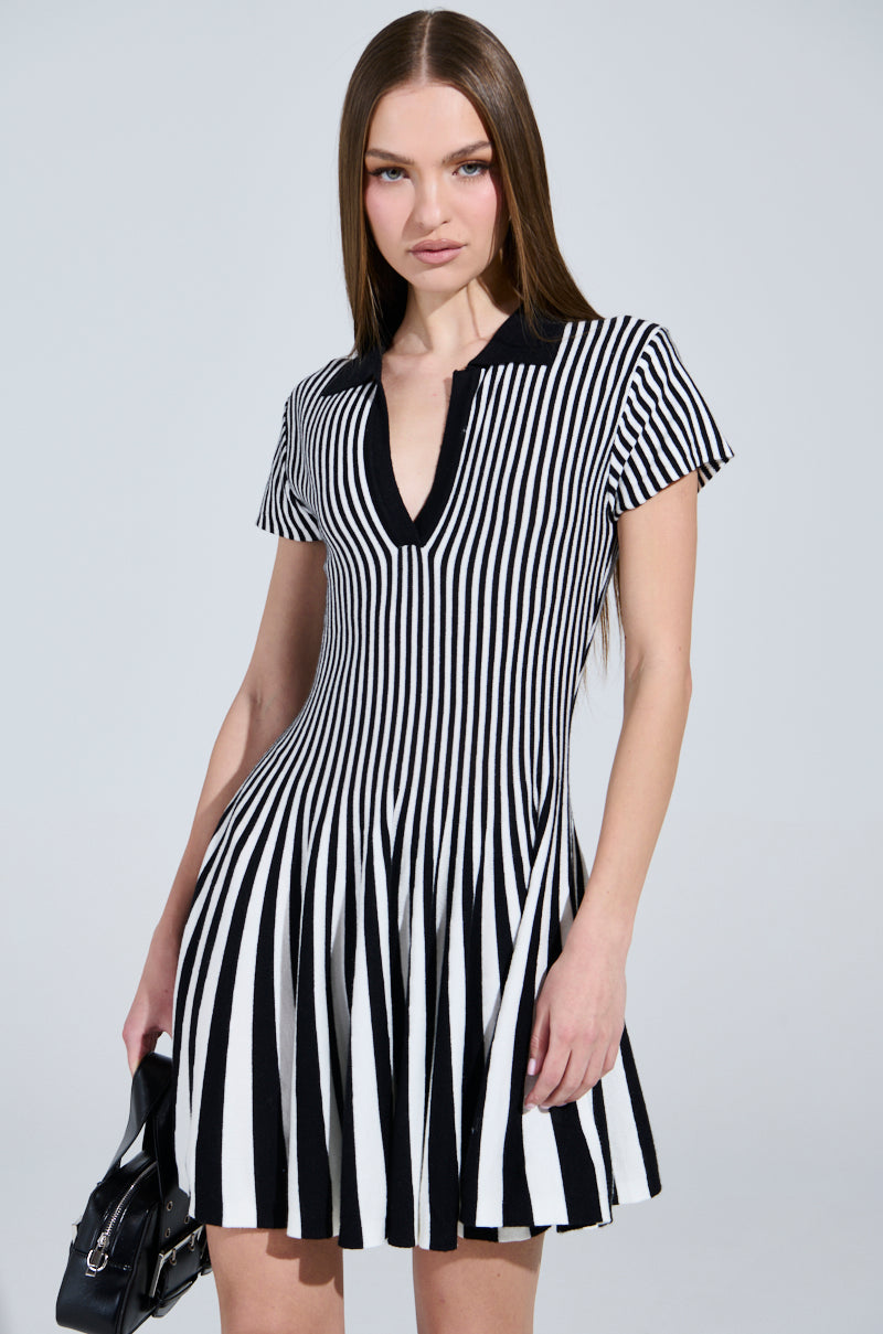 ALINA PLEATED KNIT FIT AND FLARE MINI DRESS IN BLACK AND WHITE