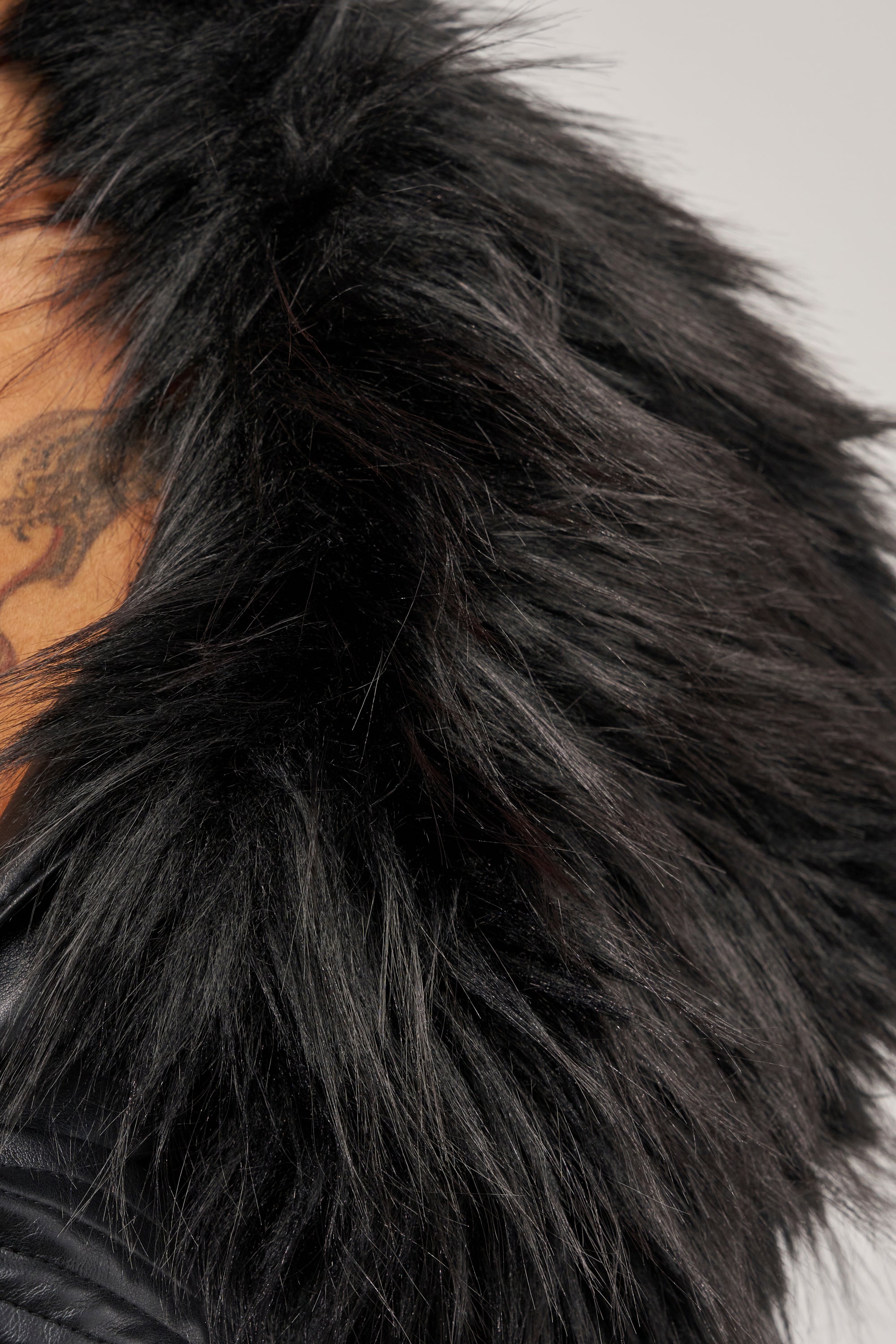 SPEND IT ALL FUR TRIM BOLERO IN BLACK