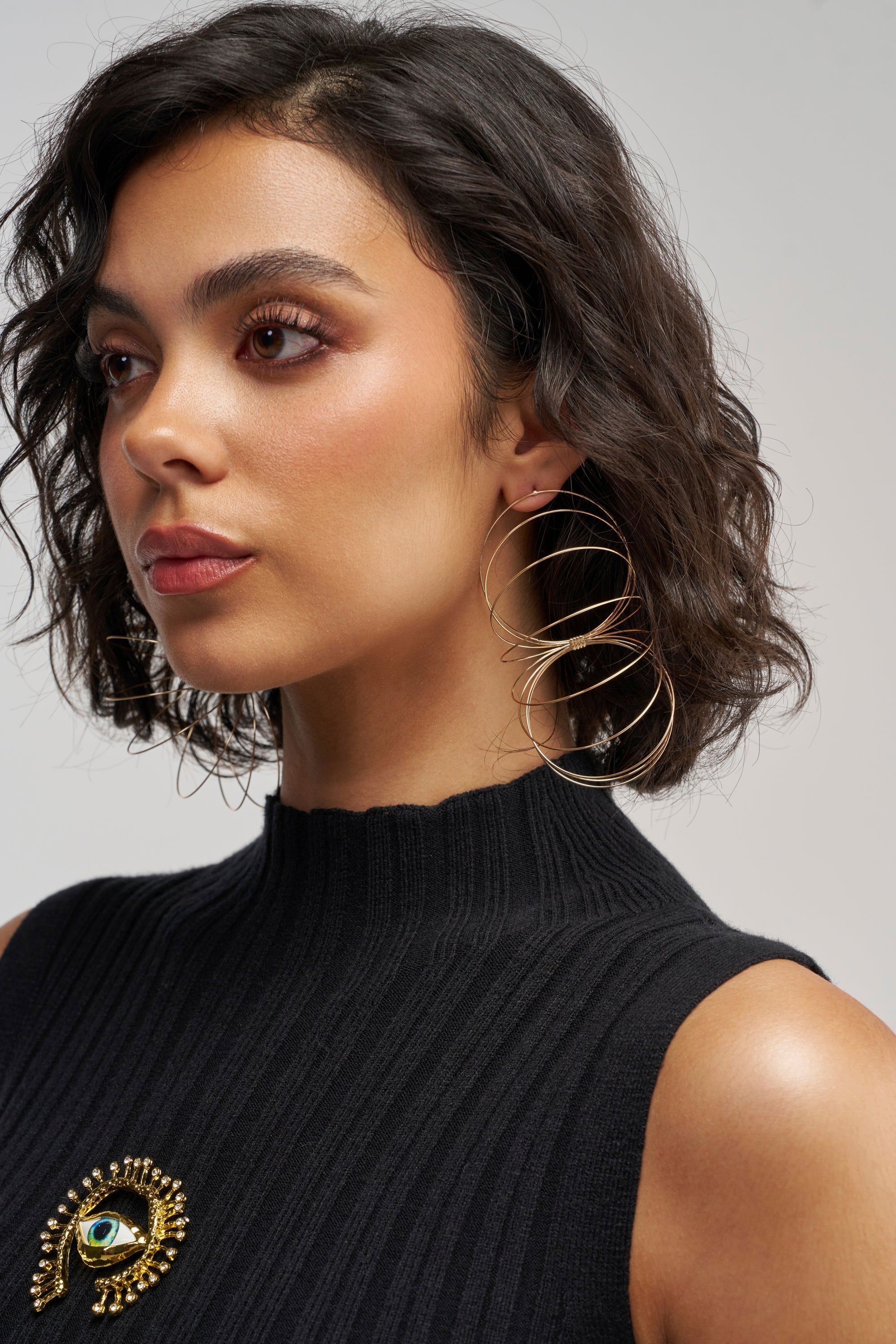 GOLD SLINKY EARRINGS