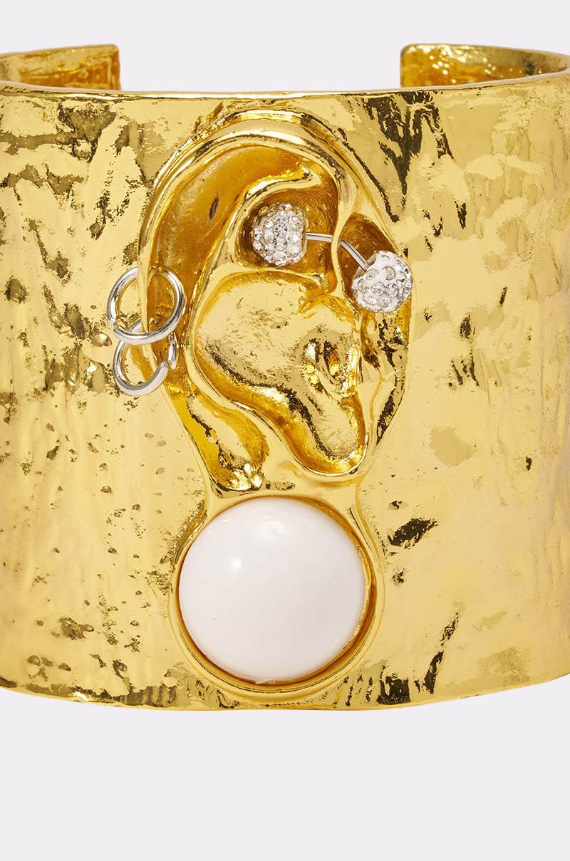 LISTEN CLOSELY METAL CUFF IN GOLD