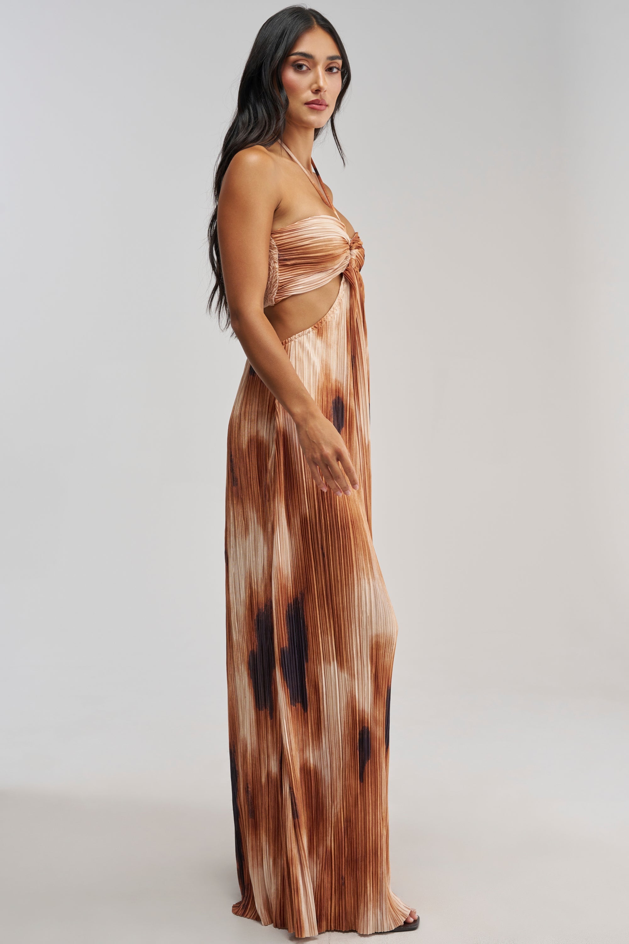 FOUL PLAY PRINTED JUMPSUIT IN RUST