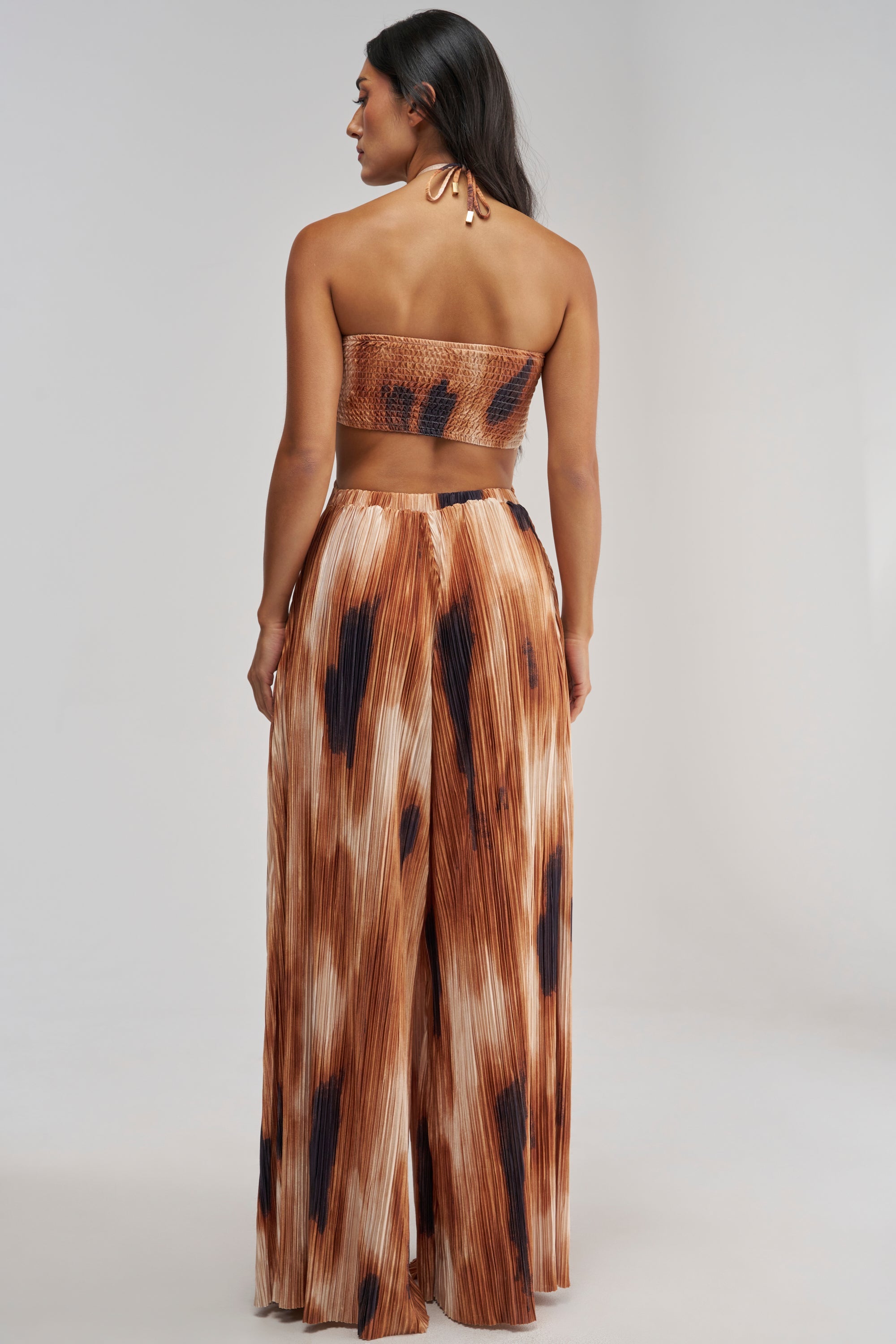FOUL PLAY PRINTED JUMPSUIT IN RUST