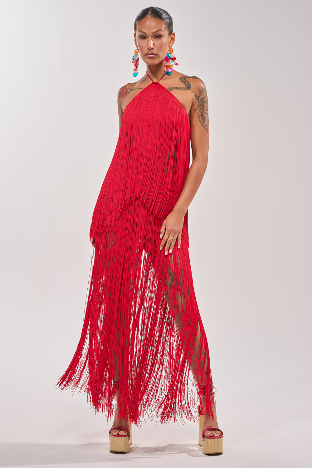 ON THE EDGE FRINGE HALTER TOP