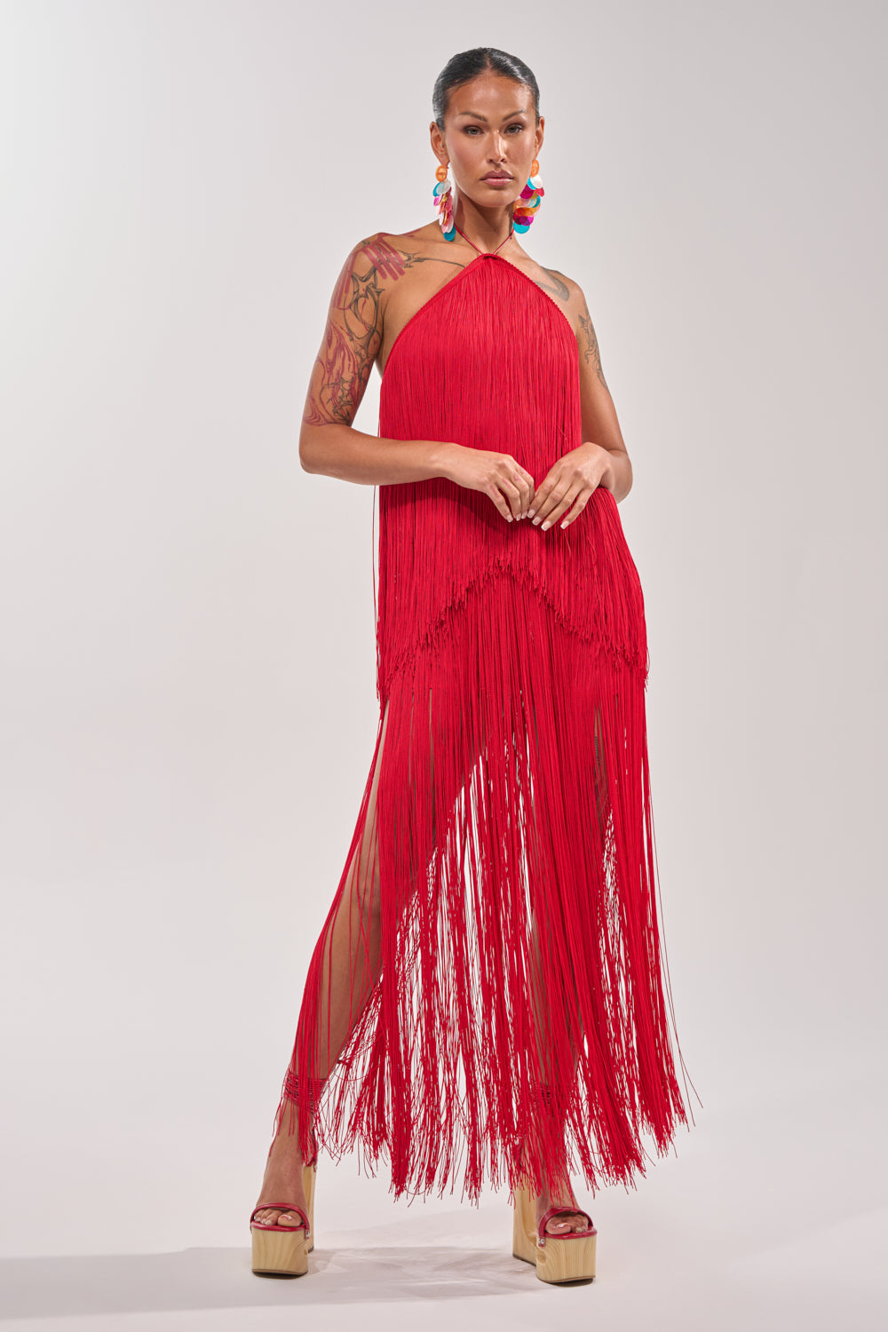 ON THE EDGE FRINGE HALTER TOP