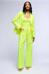 SONIQUE RELAXED FIT TROUSERS IN NEON YELLOW